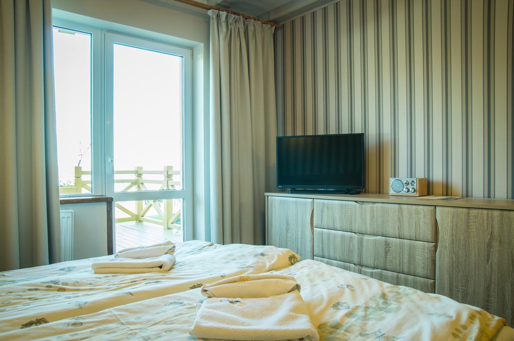 Bed and Breakfast Sloneczny Port Mikołajki Habitación foto