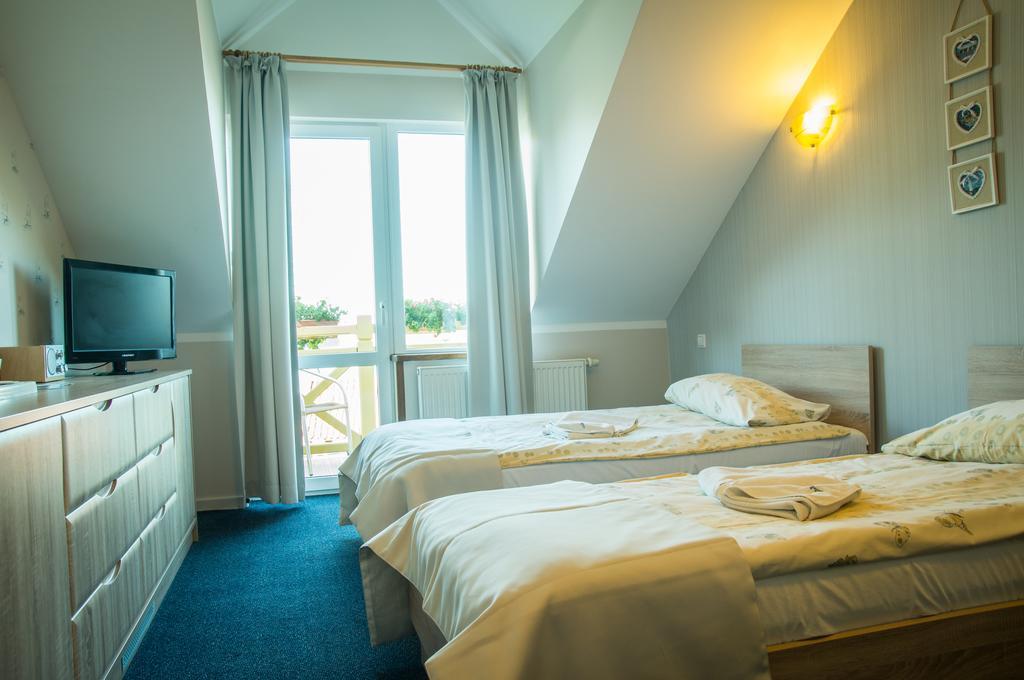 Bed and Breakfast Sloneczny Port Mikołajki Habitación foto